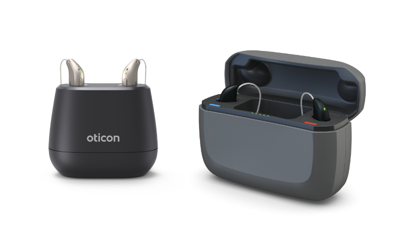 Oticon and ReSound rechargeable hearing aids pictured in chargers